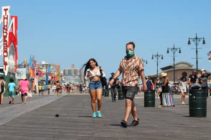 A photo of two people at Coney Island
